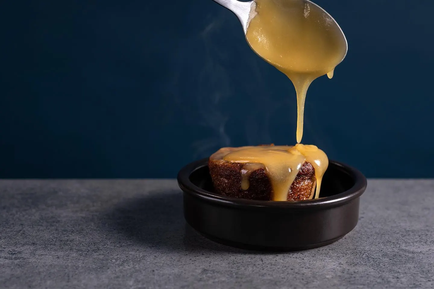 BBQ sauce being poured on navy
